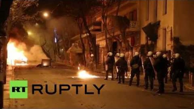 Greek rioters clash with police, hurl petrol bombs, torch cars during anti-prison protest