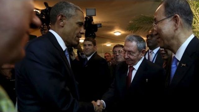 Obama & Castro shake hands during historic encounter